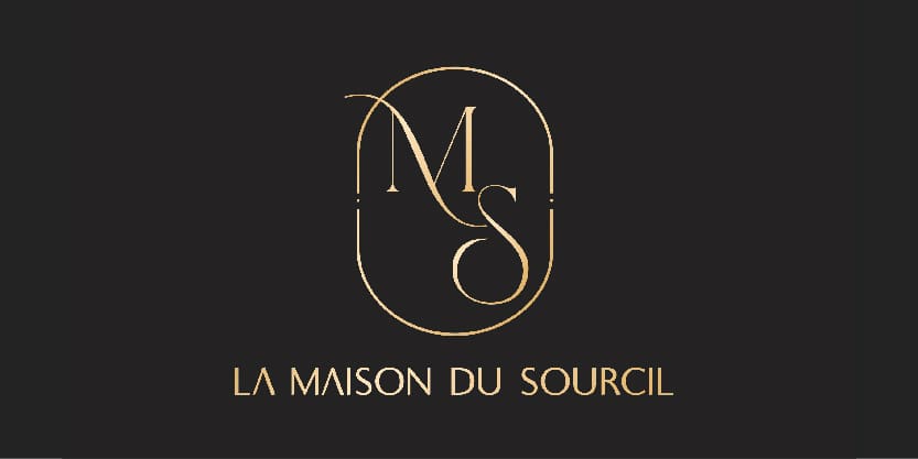 Logo doré de La Maison du Sourcil sur fond noir, avec les lettres M et S entrelacées dans un monogramme élégant.