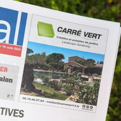 Encart publicitaire de Carré Vert dans un journal, présentant un aménagement paysager haut de gamme avec logo, coordonnées et slogan « Création et entretien de jardins ».
